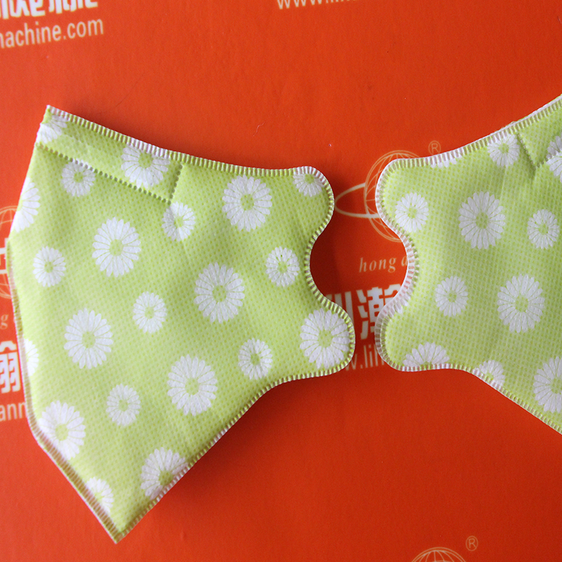 折疊口罩內(nèi)置鼻梁條機(jī)HD-0408 折疊口罩內(nèi)置鼻梁條機(jī)HD-0408